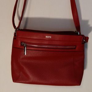 ROOTS red small shoulder bag, NWOT, never used